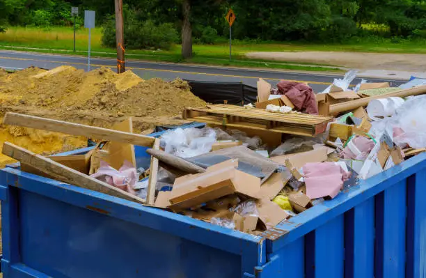 dumpsters filled with construction debris